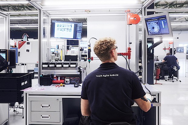 A worker involved in robot production